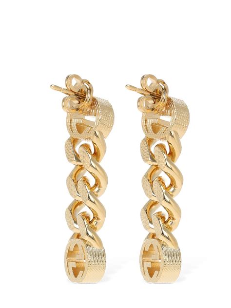 gucci earrings with interlocking g pendant